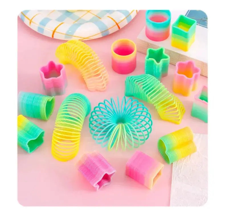 10Pcs Mini Plastic Rainbow Neon Magic Spring Toys for Kids Birthday Party Favors Baby Shower Christmas Party Gifts Pinata Filler Shopbizz Wholesale