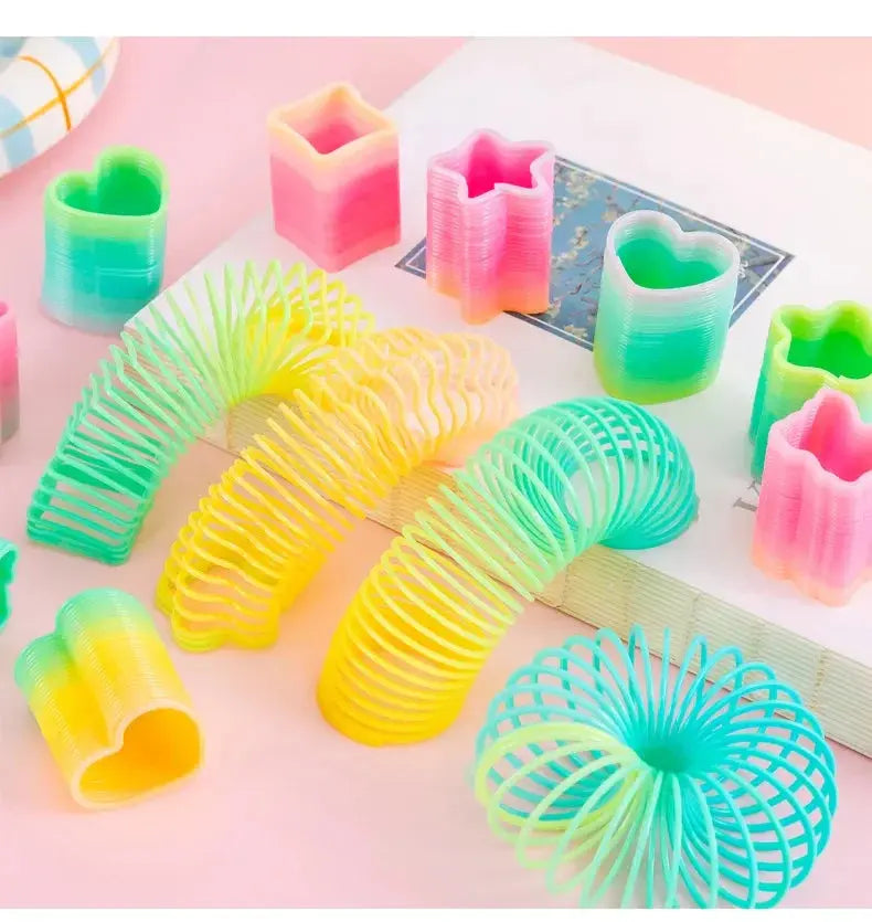 10Pcs Mini Plastic Rainbow Neon Magic Spring Toys for Kids Birthday Party Favors Baby Shower Christmas Party Gifts Pinata Filler Shopbizz Wholesale
