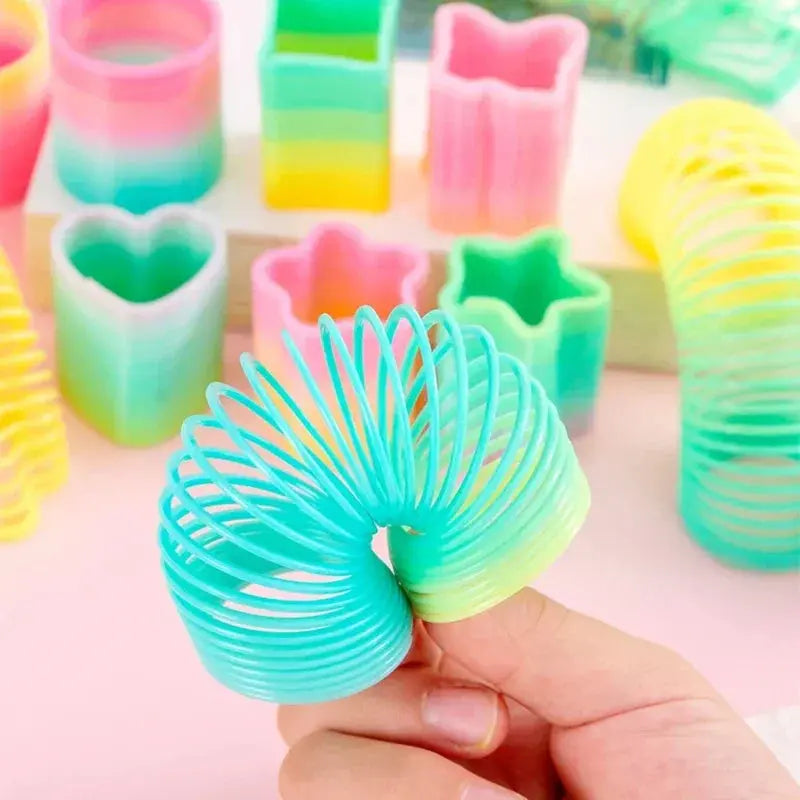 10Pcs Mini Plastic Rainbow Neon Magic Spring Toys for Kids Birthday Party Favors Baby Shower Christmas Party Gifts Pinata Filler Shopbizz Wholesale