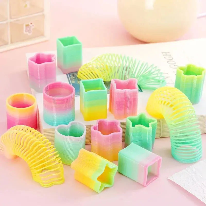 10Pcs Mini Plastic Rainbow Neon Magic Spring Toys for Kids Birthday Party Favors Baby Shower Christmas Party Gifts Pinata Filler Shopbizz Wholesale